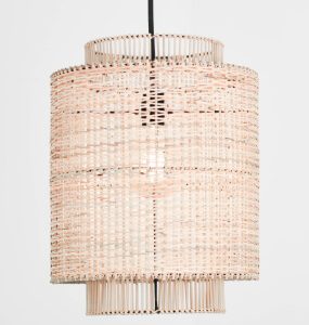 Pale woven cylindrical pendant shade hanging from a black cord